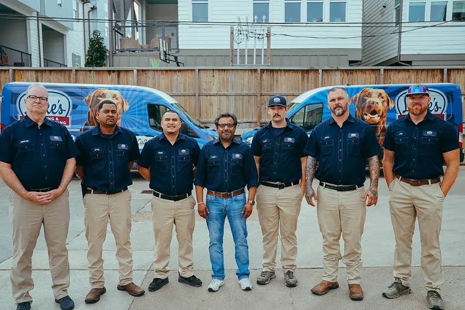 Luke's Plumbing & Air Conditioning team outside the shop